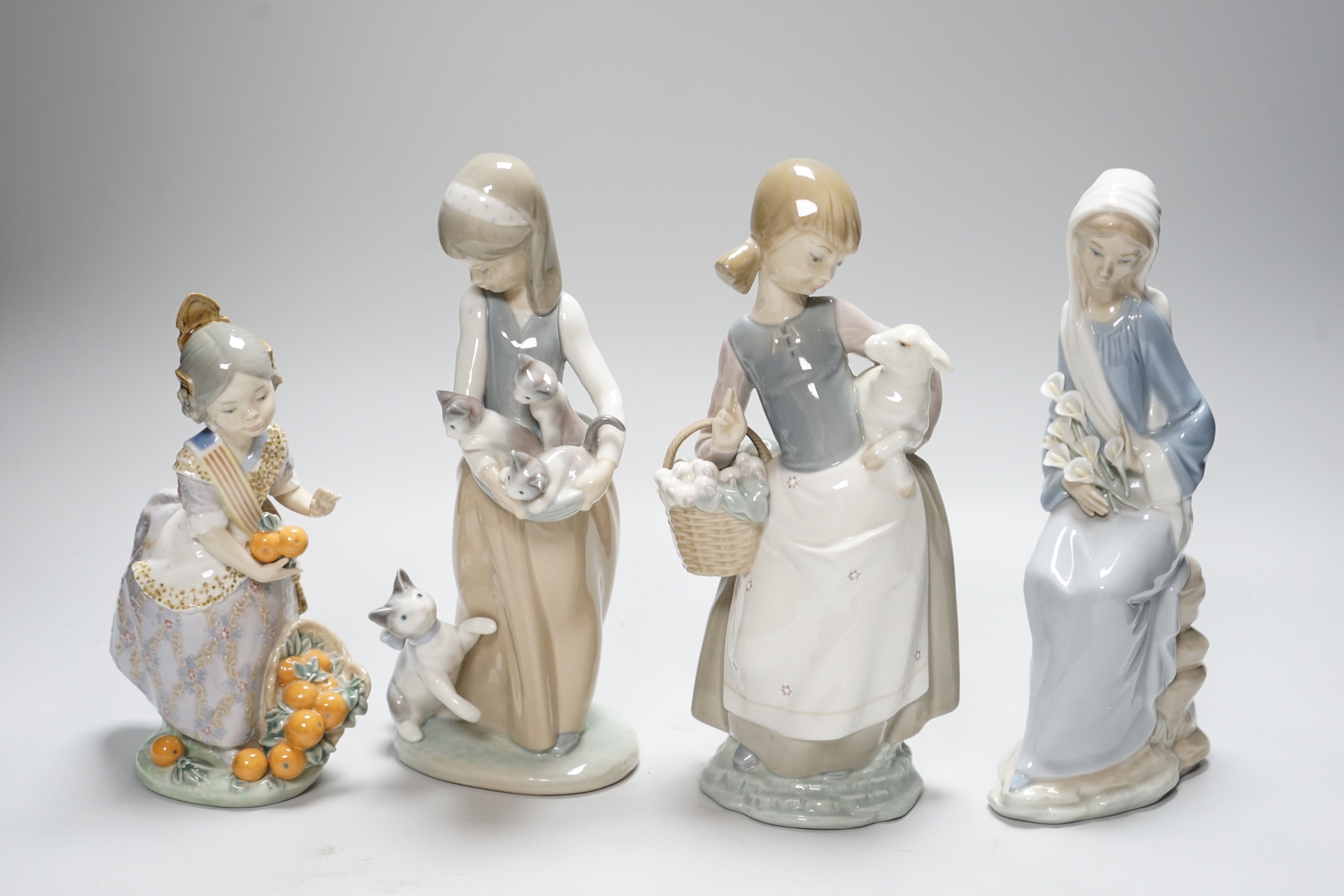 Four Lladro figures